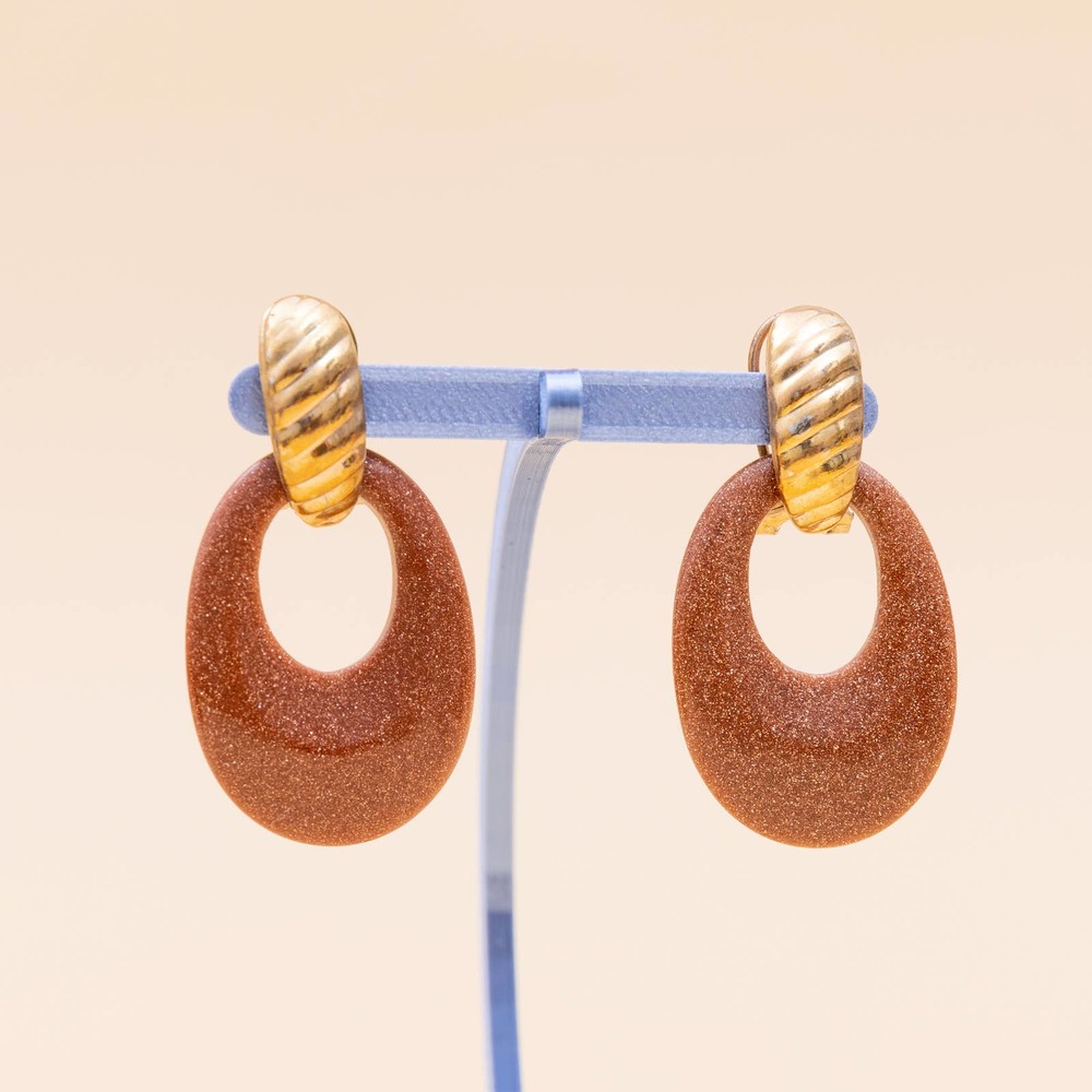 Gold tone oval vintage clip on earrings